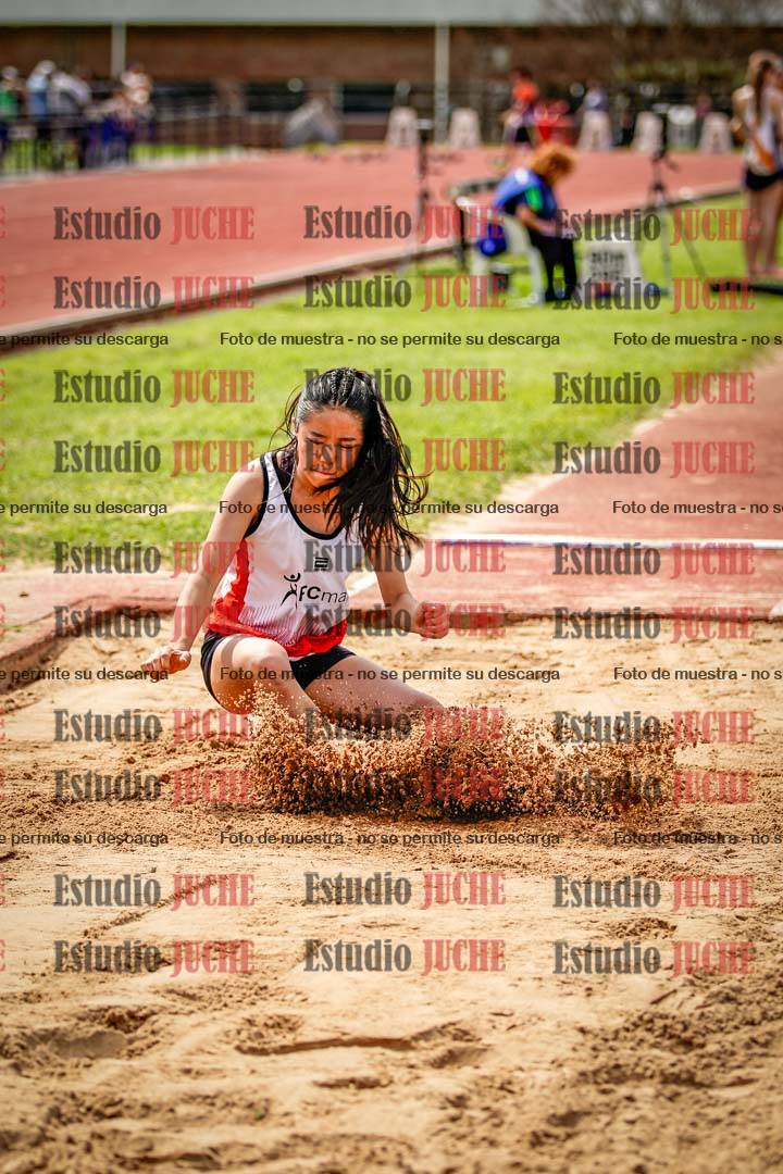 Fotos del salto en largo de mujeres