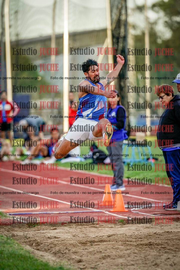 Fotos del salto en largo de varones