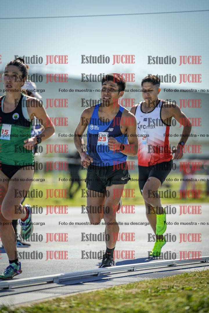 Fotos de los 5000 m llanos de mujeres y varones