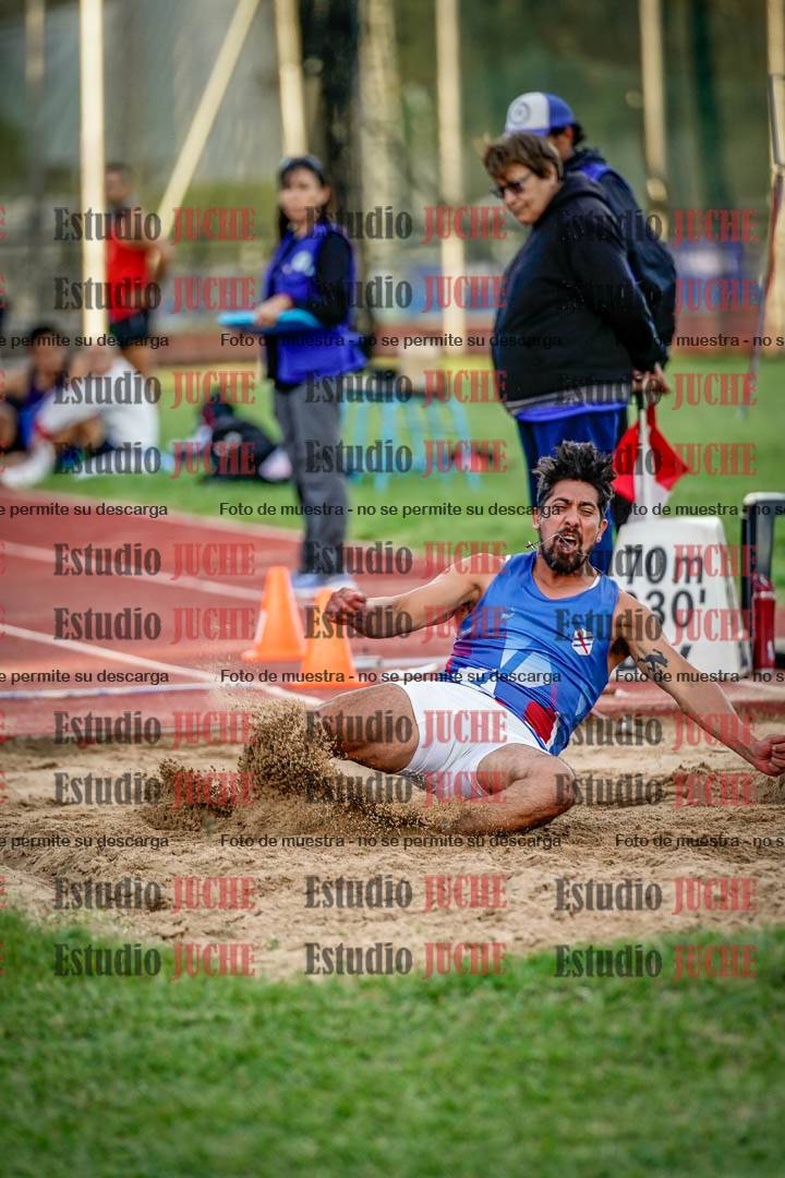Fotos del salto en largo de varones