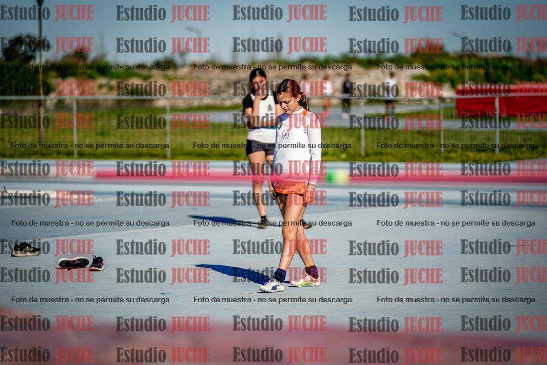 Fotos del salto en alto de mujeres y varones - U15