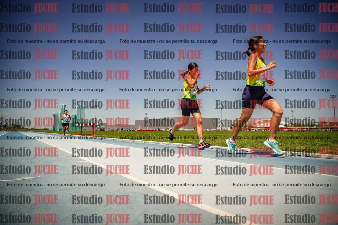 Fotos de los 10.000mts llanos de mujeres y varones LIBRE/MASTER - FINAL