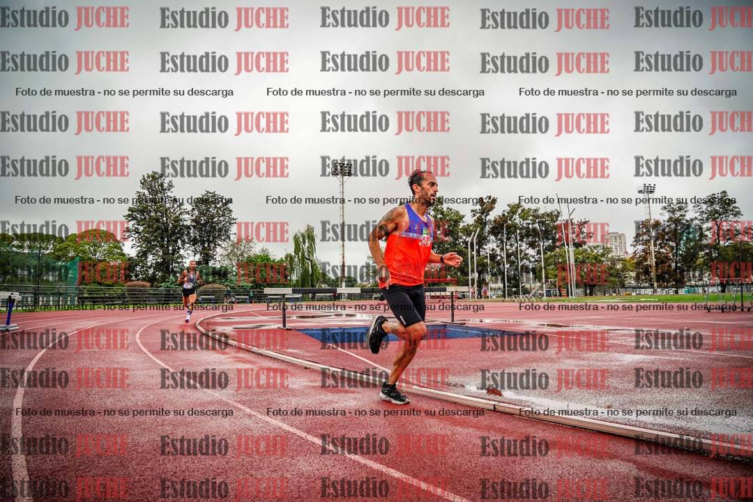 Fotos de los 5000 m de varones - serie 2