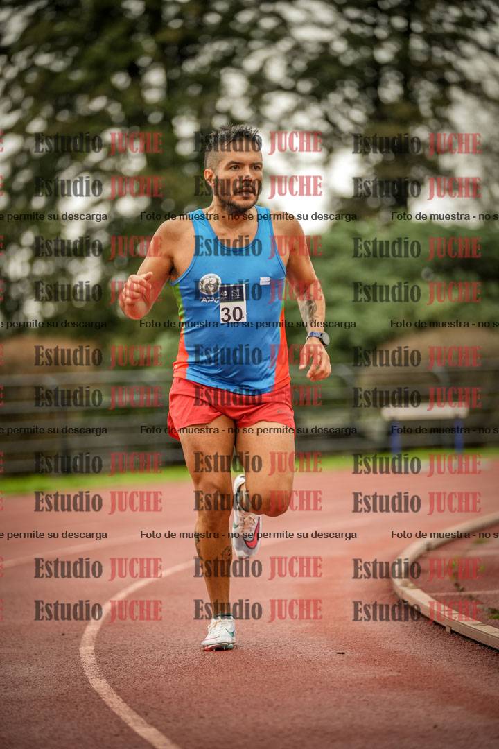 Fotos de los 5000 m de varones - serie 2