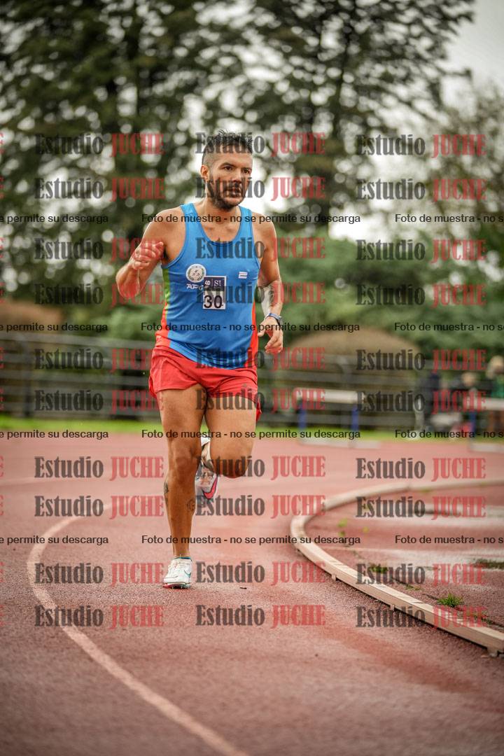 Fotos de los 5000 m de varones - serie 2