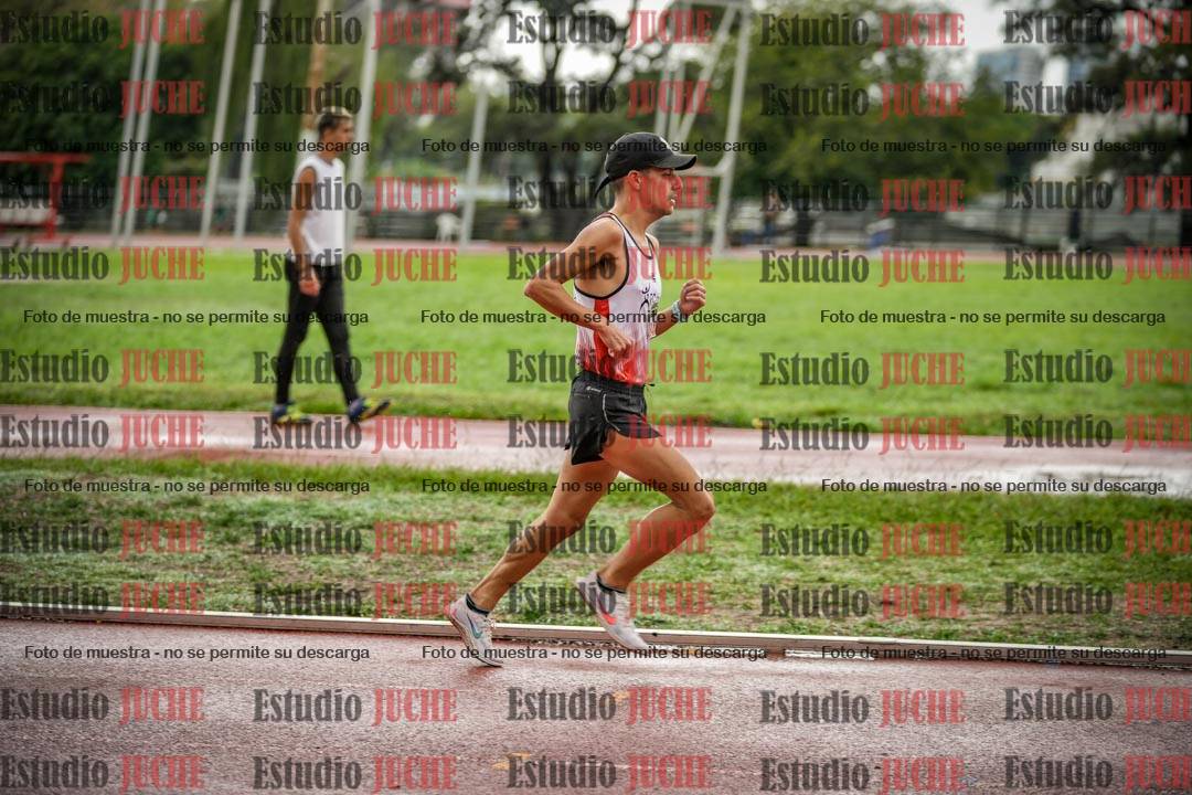 Fotos de los 5000 m de varones - serie 2