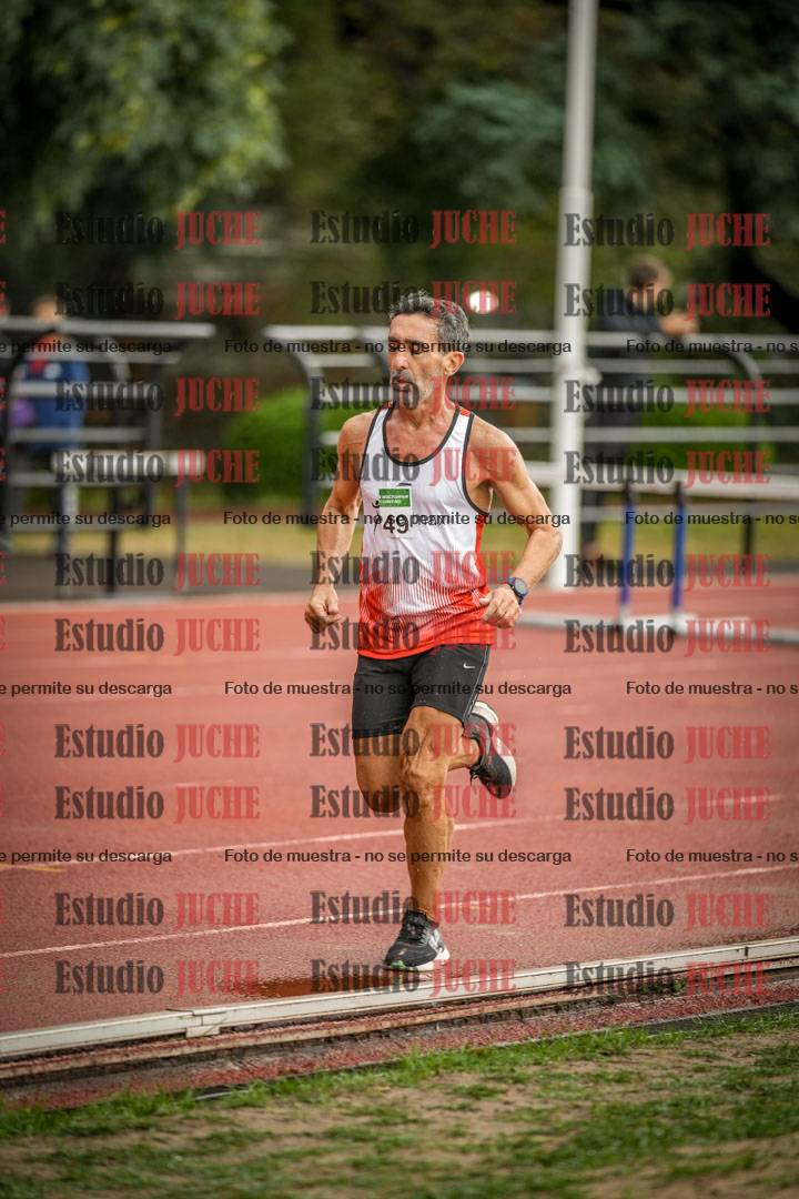 Fotos de los 5000 m de varones - serie 2