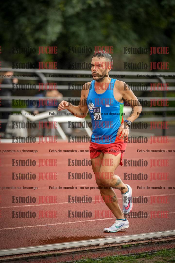 Fotos de los 5000 m de varones - serie 2