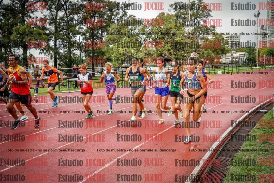 Fotos de los 5000 m de mujeres y varones - serie 3