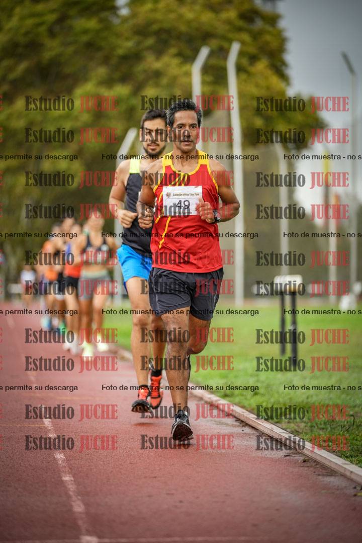 Fotos de los 5000 m de mujeres y varones - serie 3