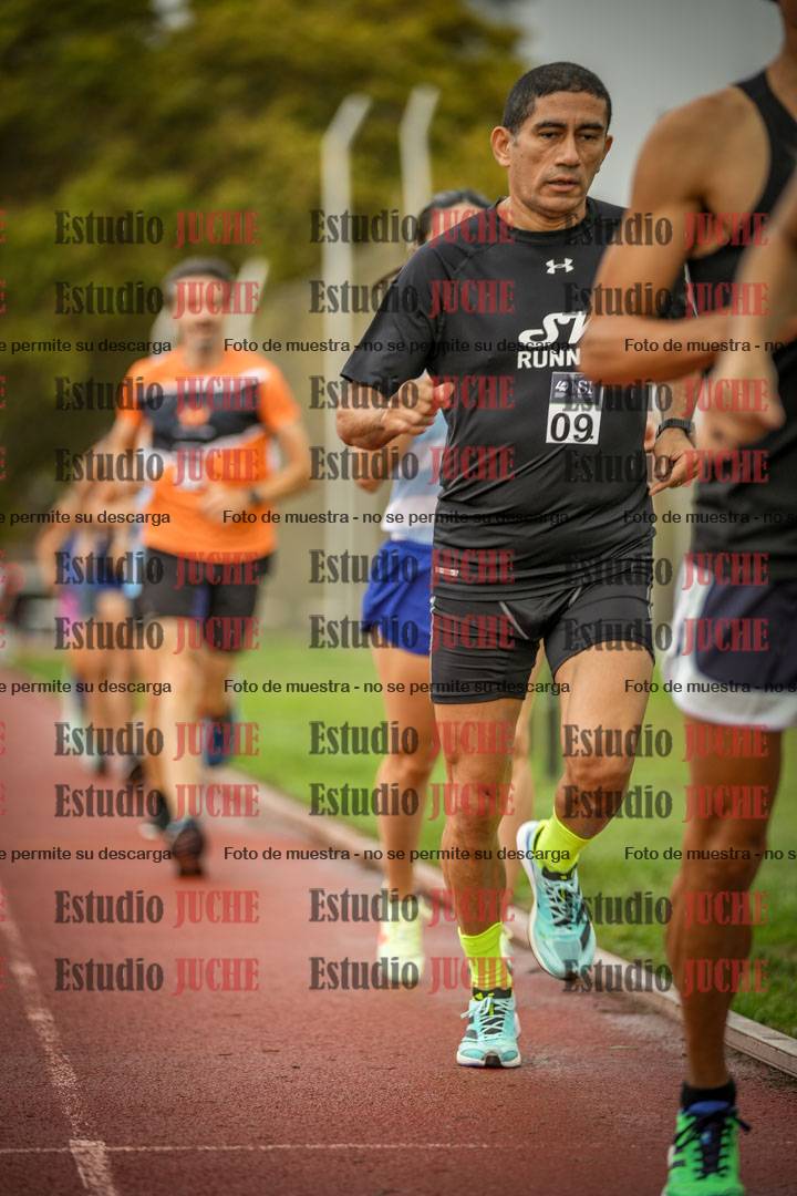 Fotos de los 5000 m de mujeres y varones - serie 3