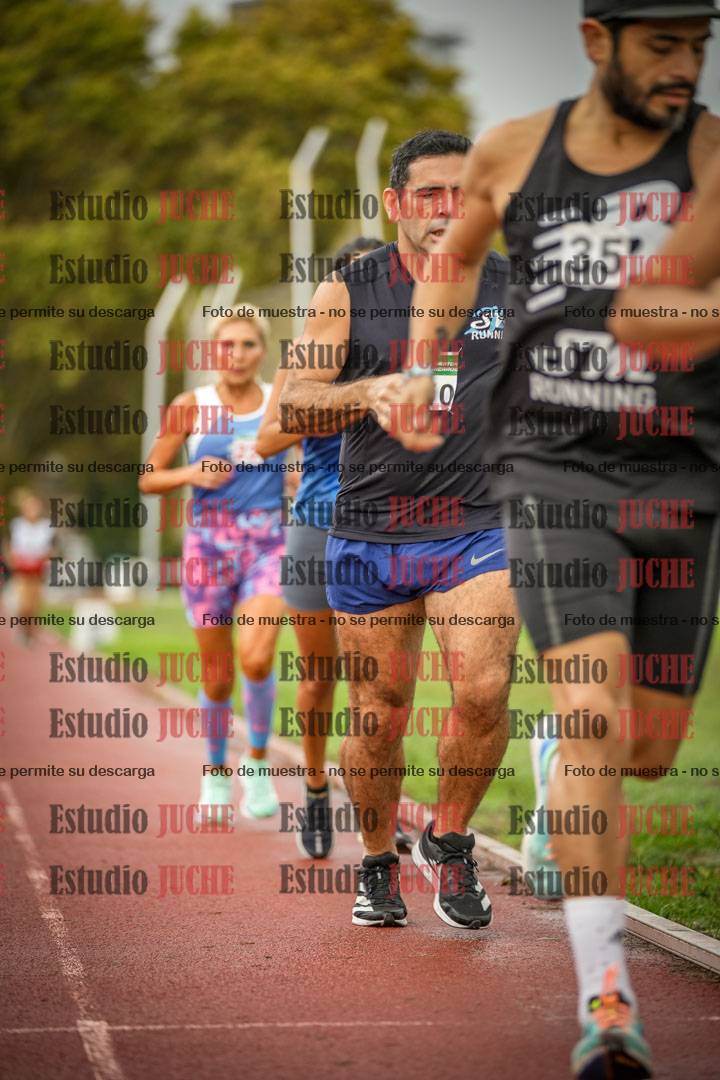 Fotos de los 5000 m de mujeres y varones - serie 3