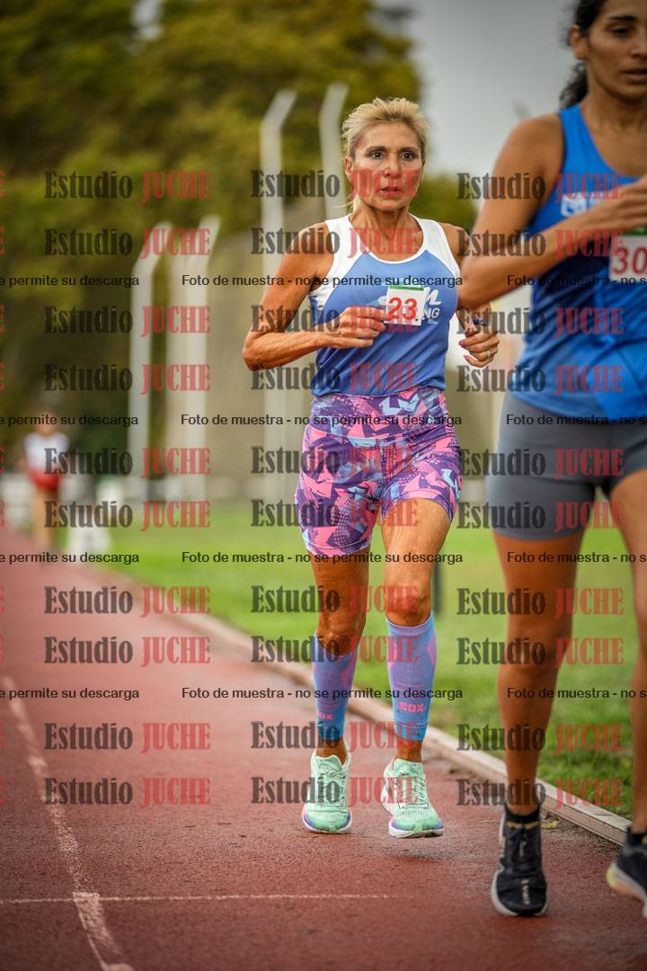 Fotos de los 5000 m de mujeres y varones - serie 3