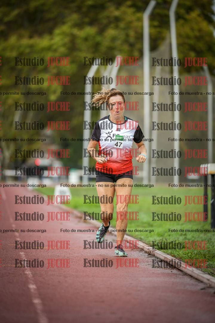 Fotos de los 5000 m de mujeres y varones - serie 3