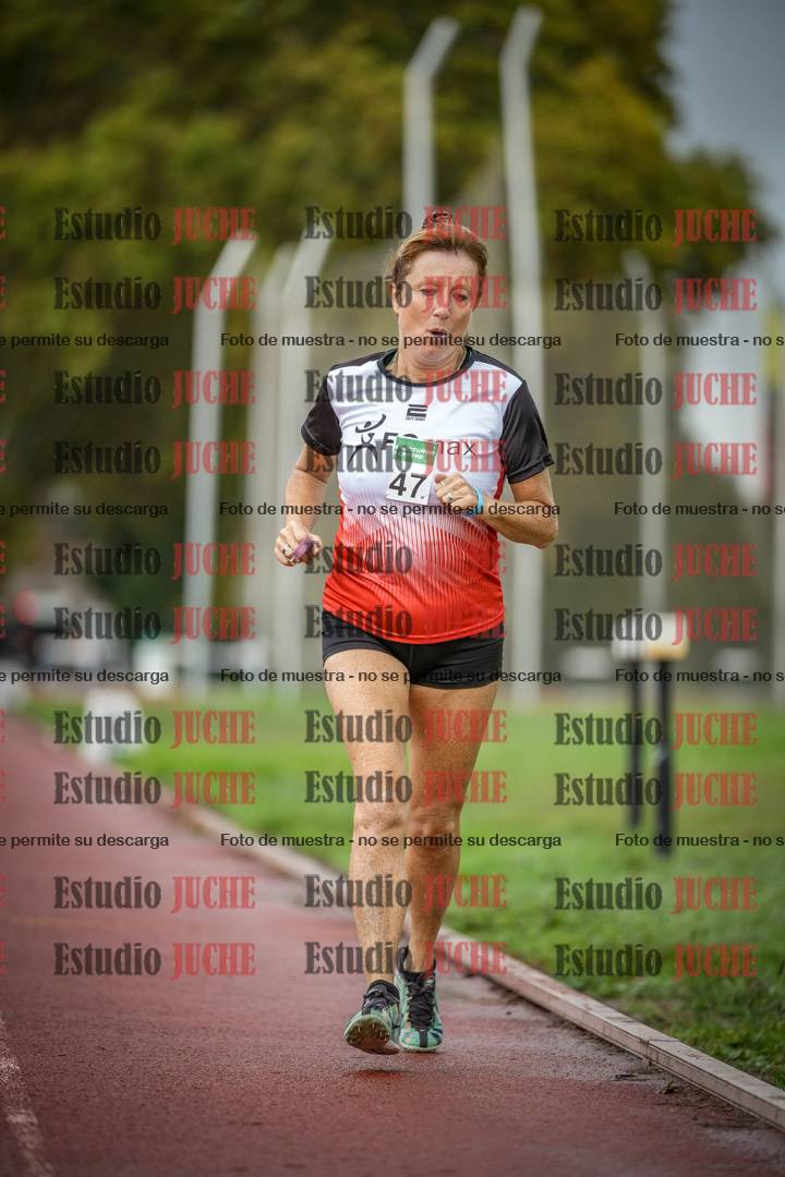 Fotos de los 5000 m de mujeres y varones - serie 3