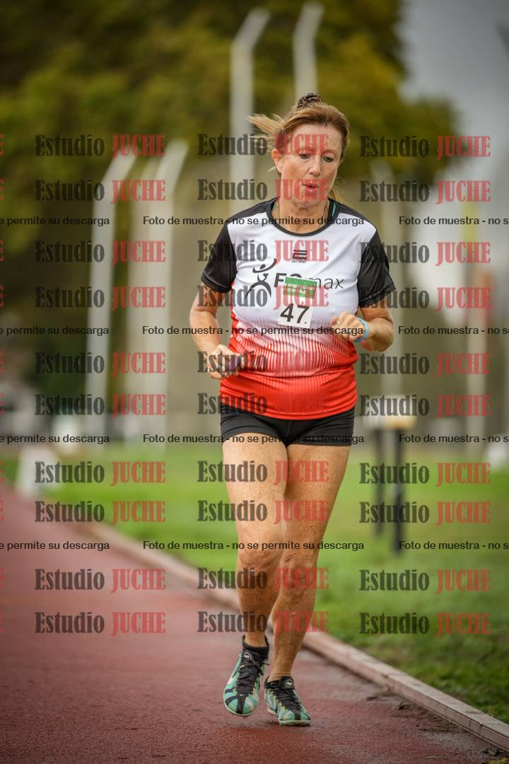 Fotos de los 5000 m de mujeres y varones - serie 3