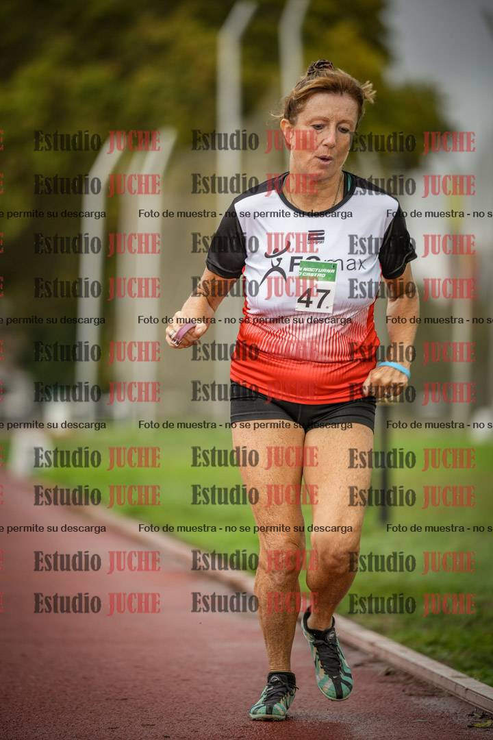 Fotos de los 5000 m de mujeres y varones - serie 3