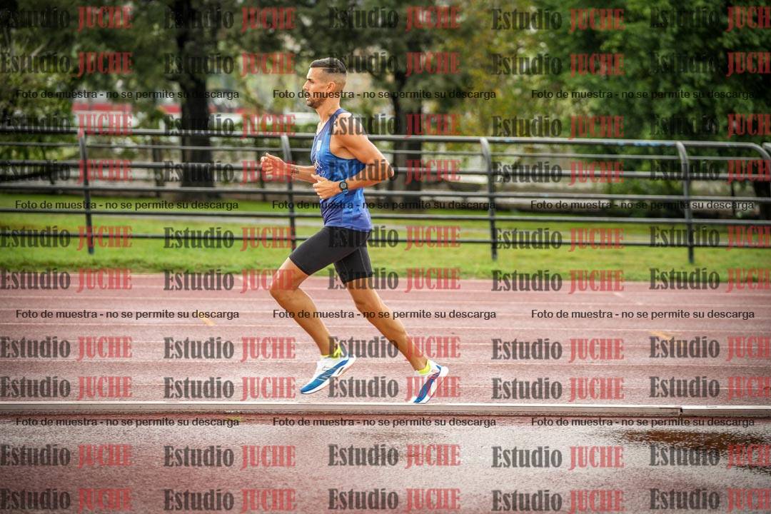 Fotos de los 5000 m de mujeres y varones - serie 3