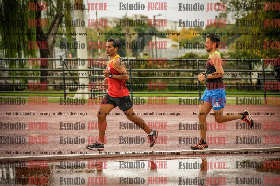 Fotos de los 5000 m de mujeres y varones - serie 3