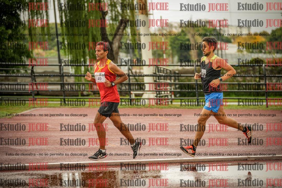 Fotos de los 5000 m de mujeres y varones - serie 3
