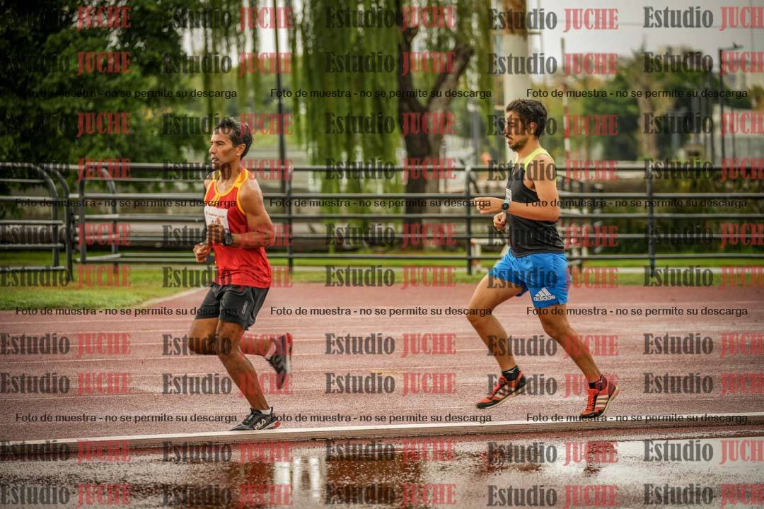 Fotos de los 5000 m de mujeres y varones - serie 3
