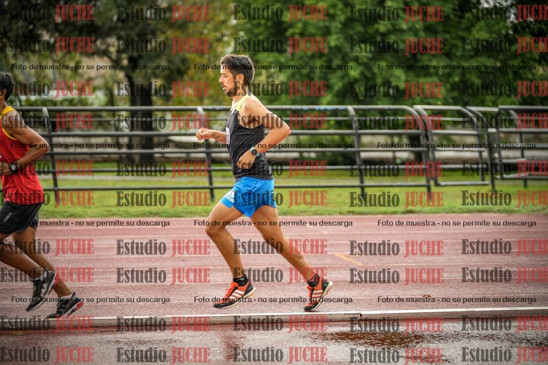 Fotos de los 5000 m de mujeres y varones - serie 3