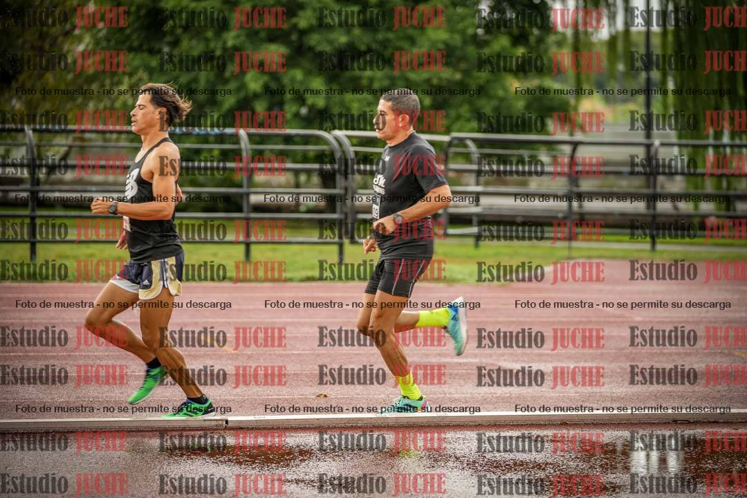 Fotos de los 5000 m de mujeres y varones - serie 3