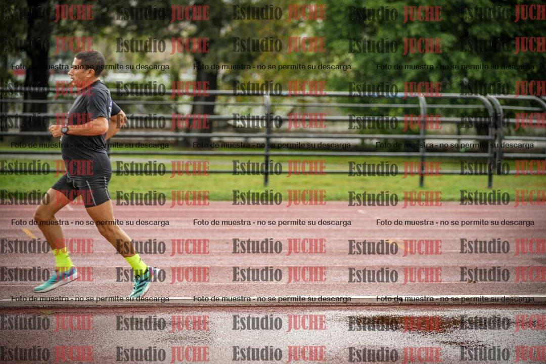 Fotos de los 5000 m de mujeres y varones - serie 3