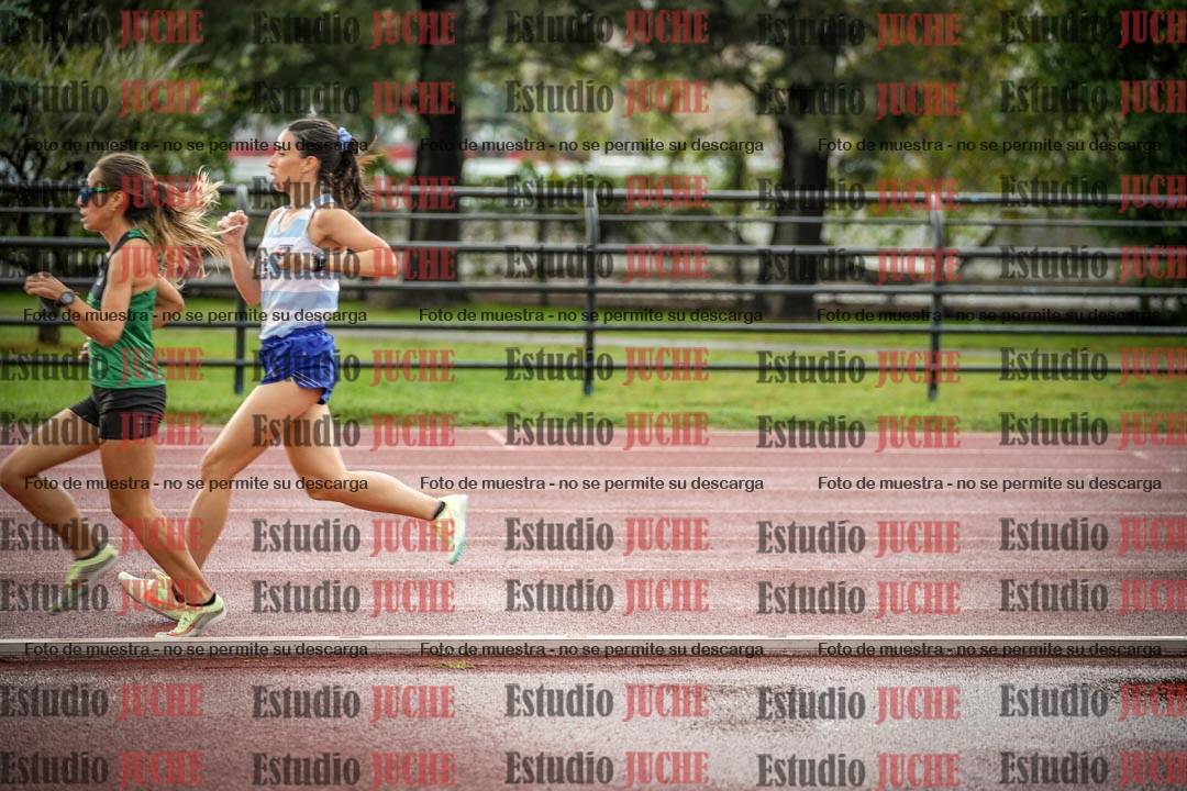 Fotos de los 5000 m de mujeres y varones - serie 3