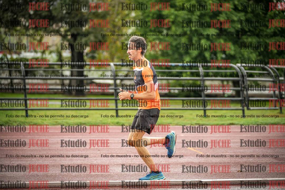 Fotos de los 5000 m de mujeres y varones - serie 3