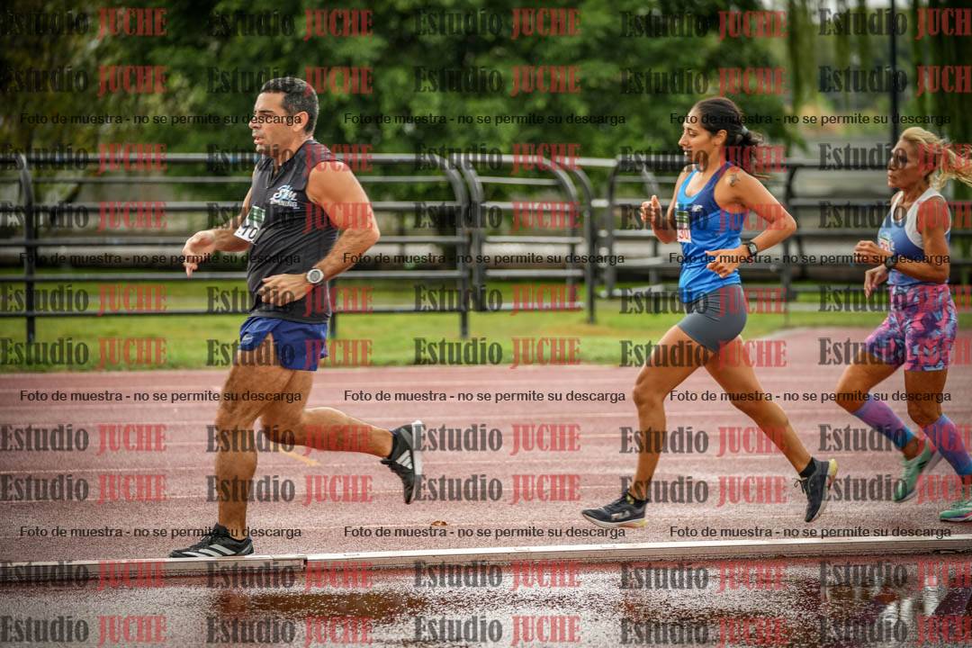 Fotos de los 5000 m de mujeres y varones - serie 3