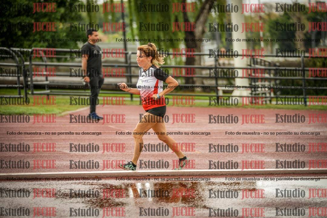 Fotos de los 5000 m de mujeres y varones - serie 3