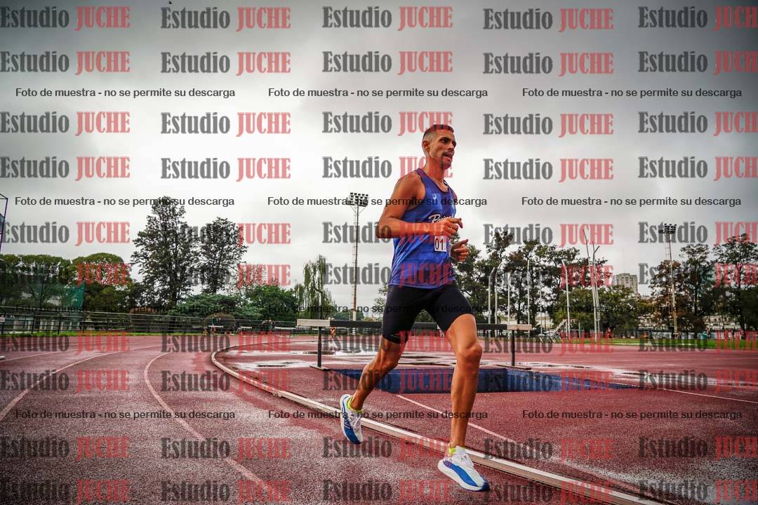 Fotos de los 5000 m de mujeres y varones - serie 3