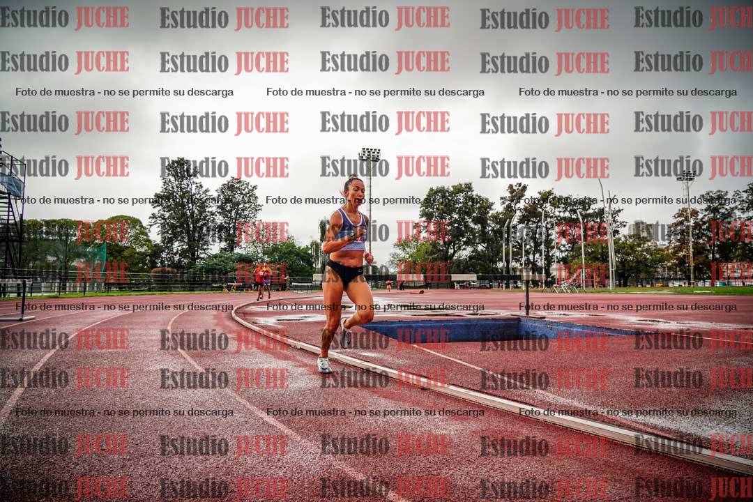 Fotos de los 5000 m de mujeres y varones - serie 3