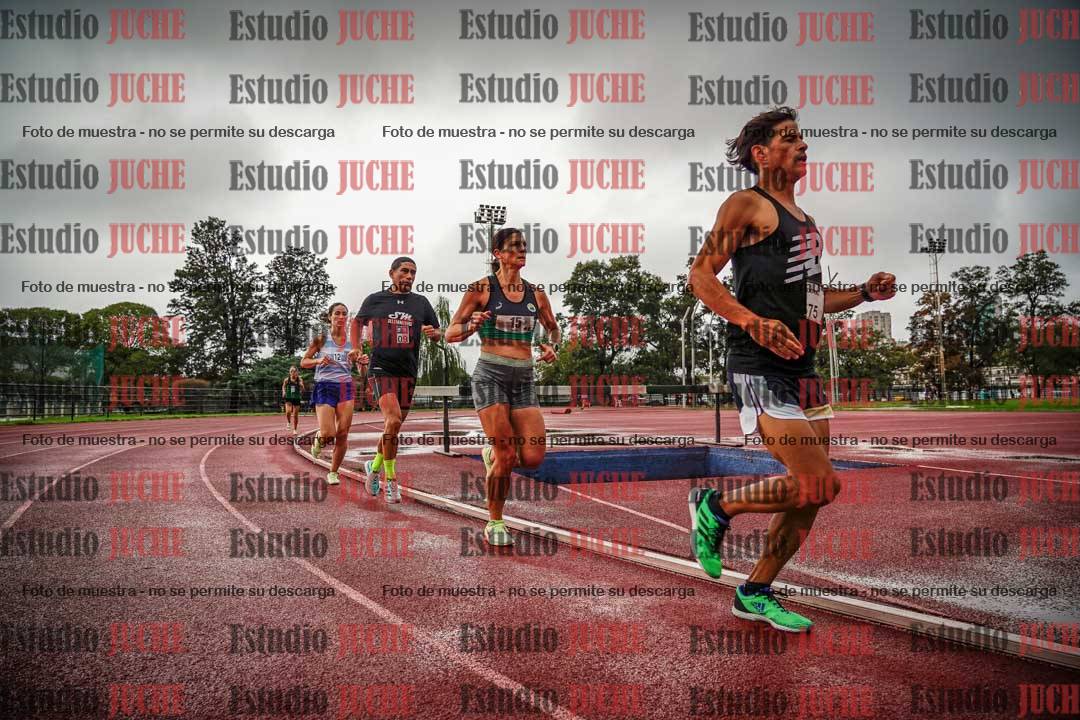 Fotos de los 5000 m de mujeres y varones - serie 3