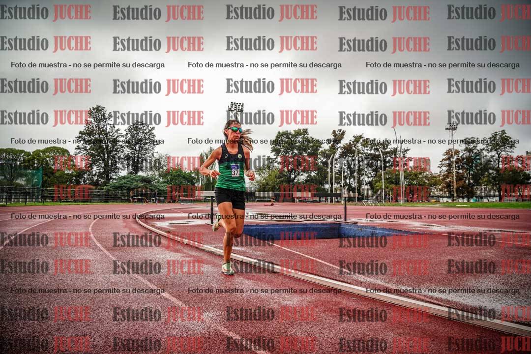 Fotos de los 5000 m de mujeres y varones - serie 3