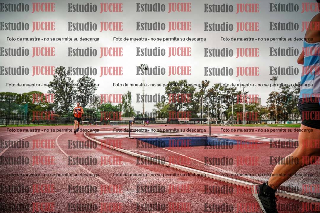 Fotos de los 5000 m de mujeres y varones - serie 3