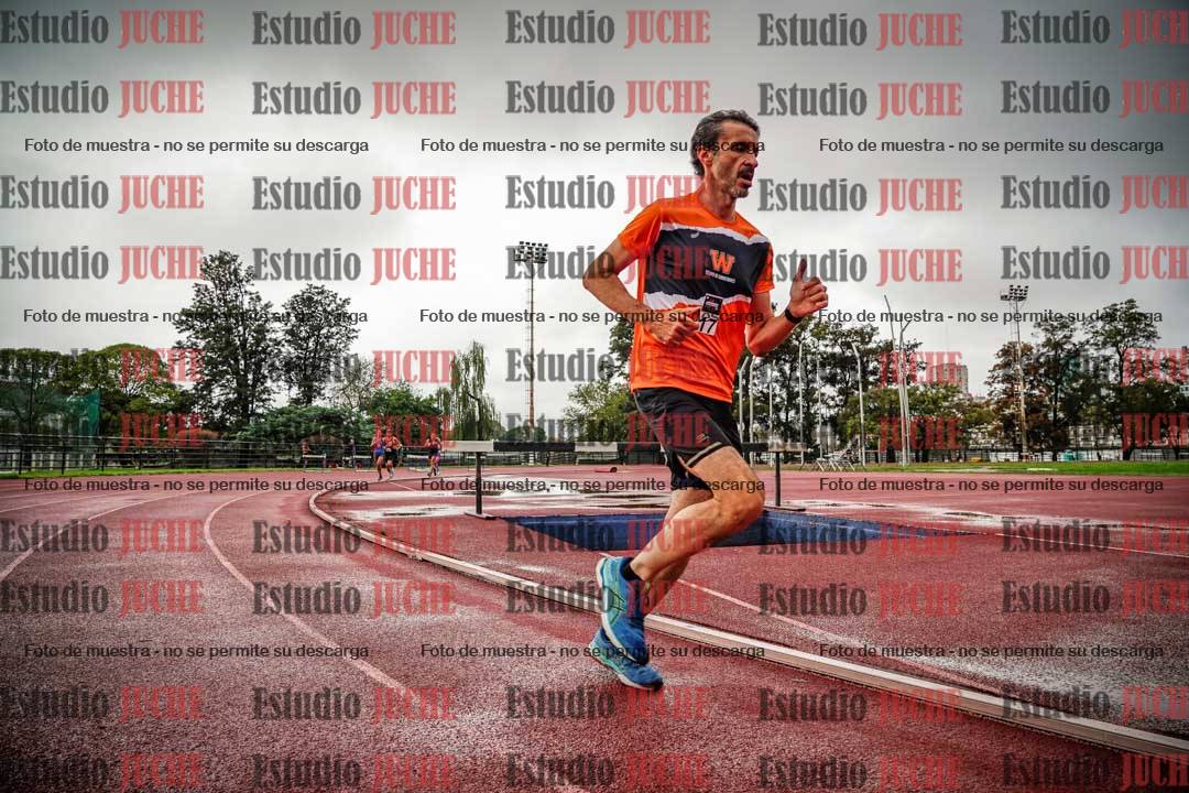Fotos de los 5000 m de mujeres y varones - serie 3