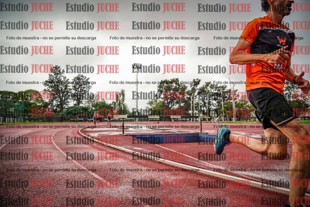 Fotos de los 5000 m de mujeres y varones - serie 3