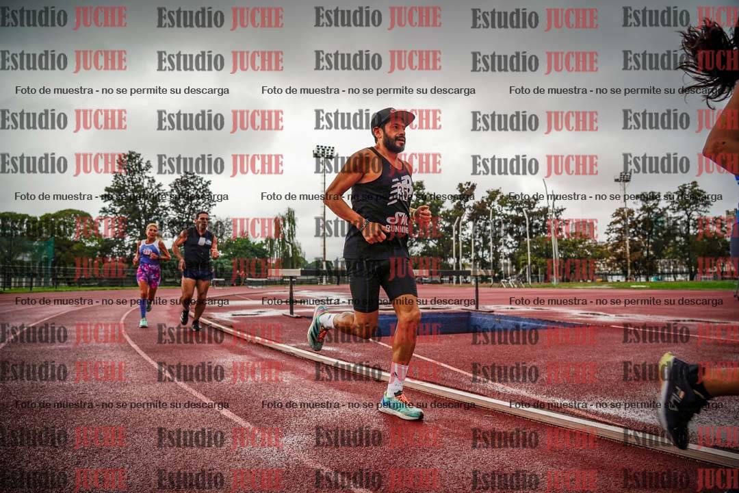 Fotos de los 5000 m de mujeres y varones - serie 3
