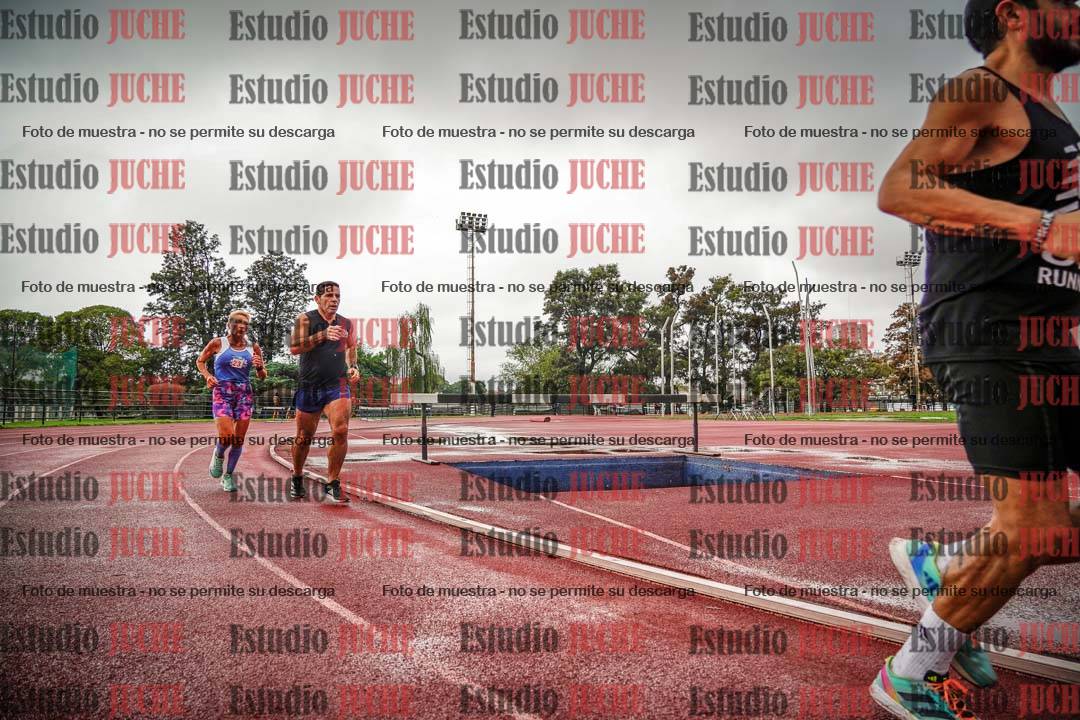 Fotos de los 5000 m de mujeres y varones - serie 3