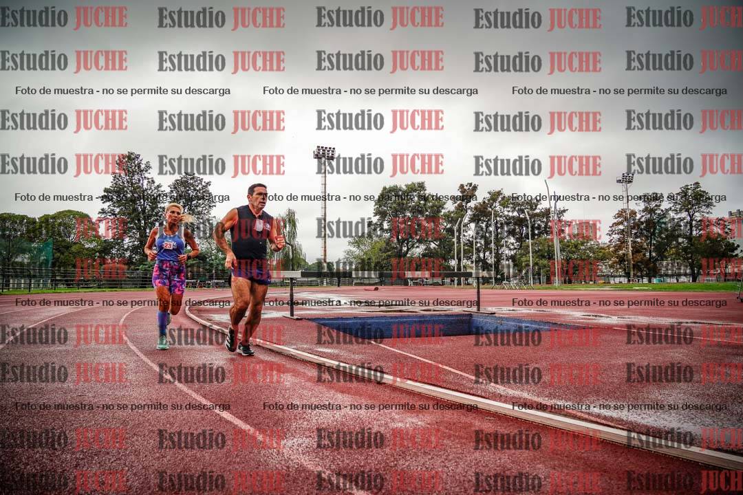 Fotos de los 5000 m de mujeres y varones - serie 3