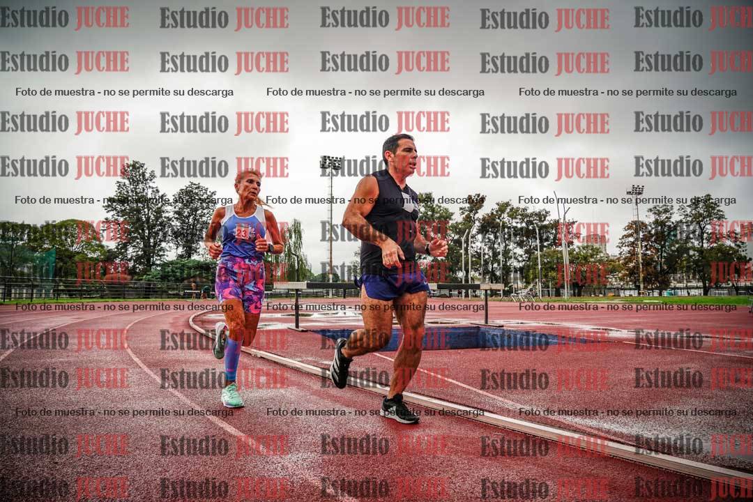 Fotos de los 5000 m de mujeres y varones - serie 3