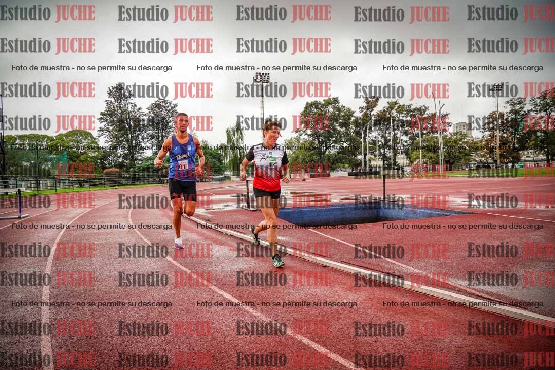 Fotos de los 5000 m de mujeres y varones - serie 3