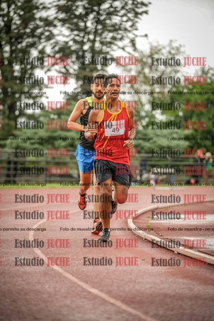 Fotos de los 5000 m de mujeres y varones - serie 3