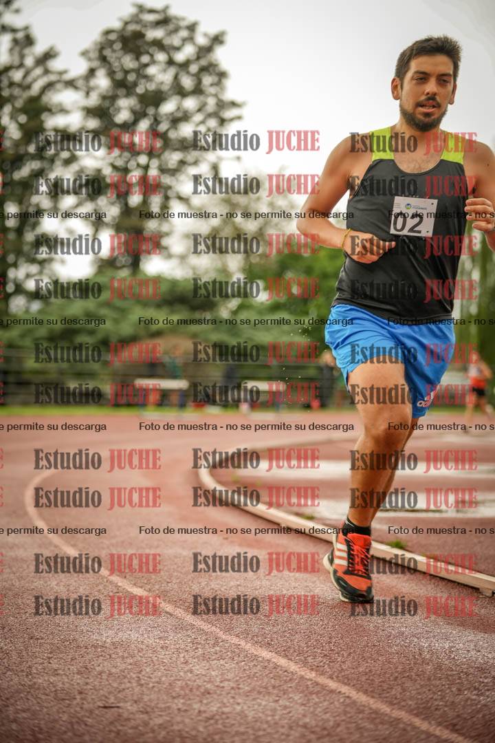 Fotos de los 5000 m de mujeres y varones - serie 3
