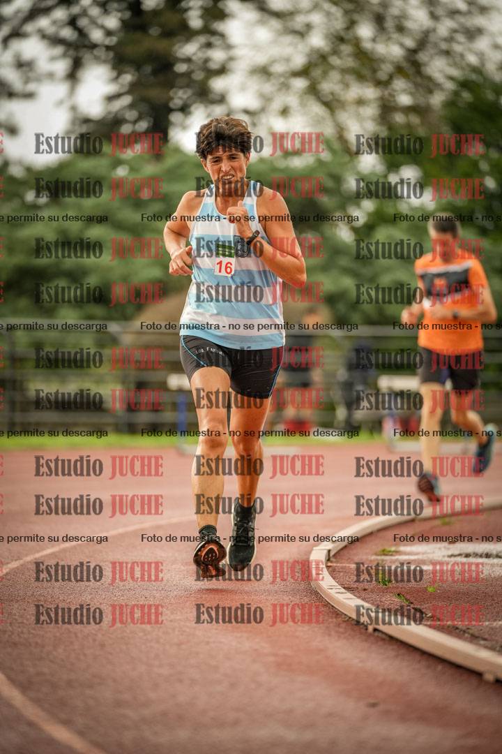 Fotos de los 5000 m de mujeres y varones - serie 3