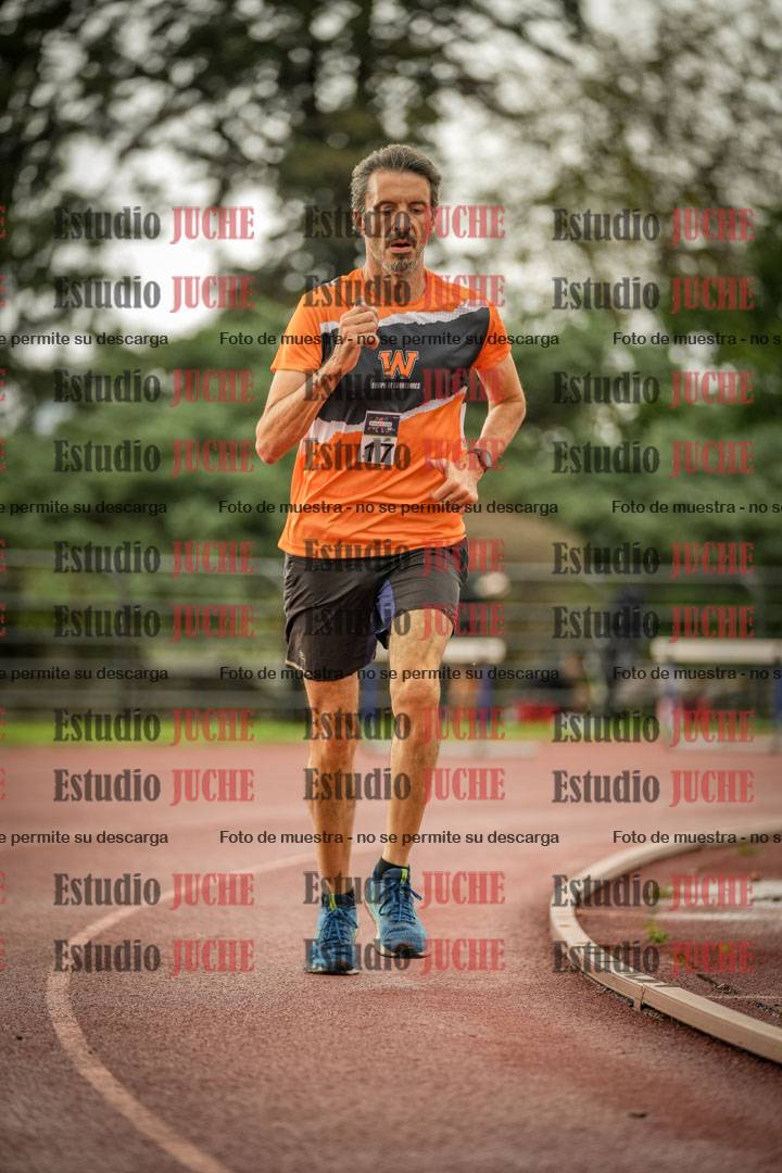 Fotos de los 5000 m de mujeres y varones - serie 3