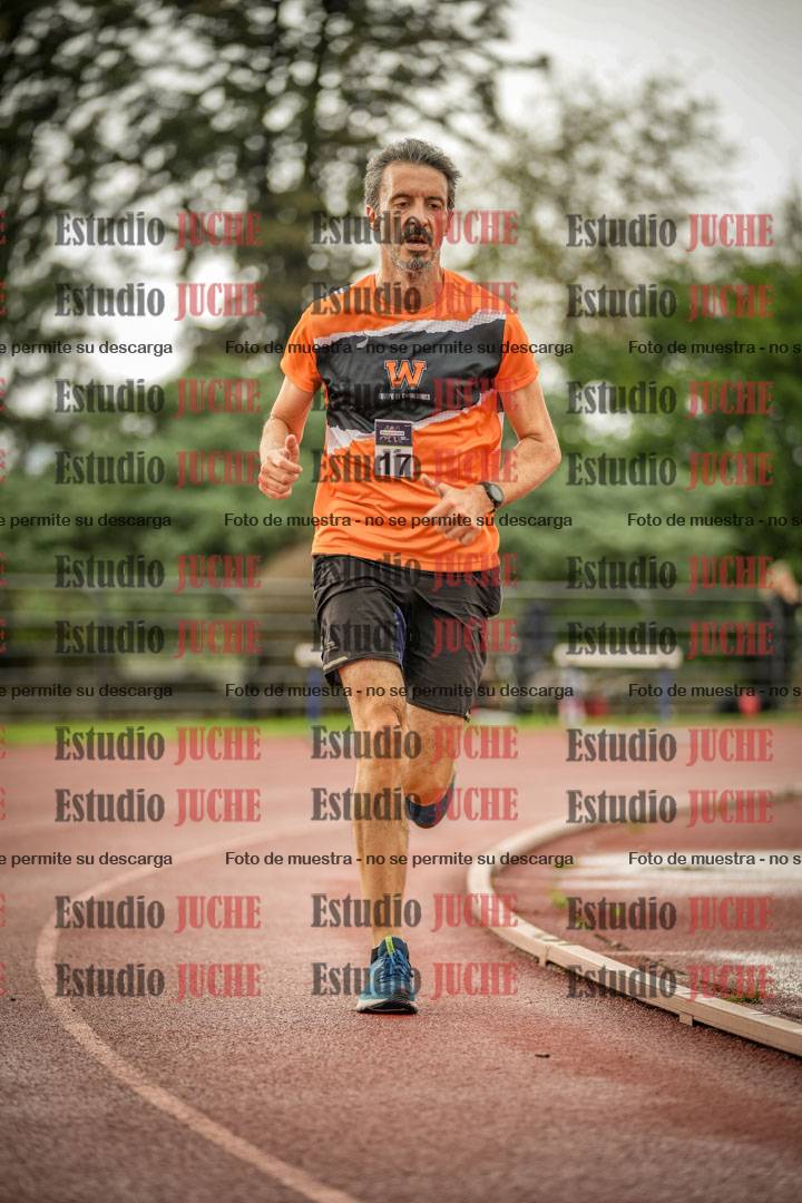 Fotos de los 5000 m de mujeres y varones - serie 3