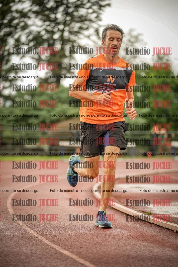 Fotos de los 5000 m de mujeres y varones - serie 3